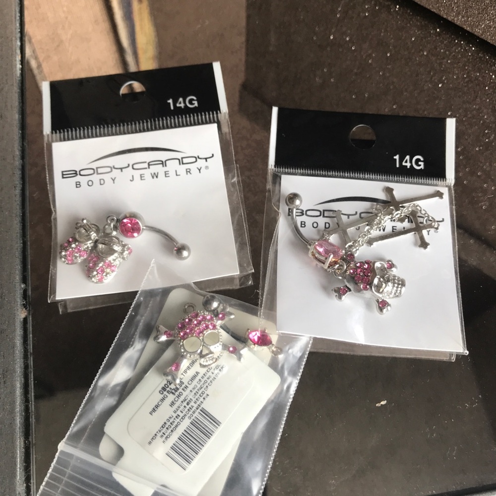 3 brand new belly rings